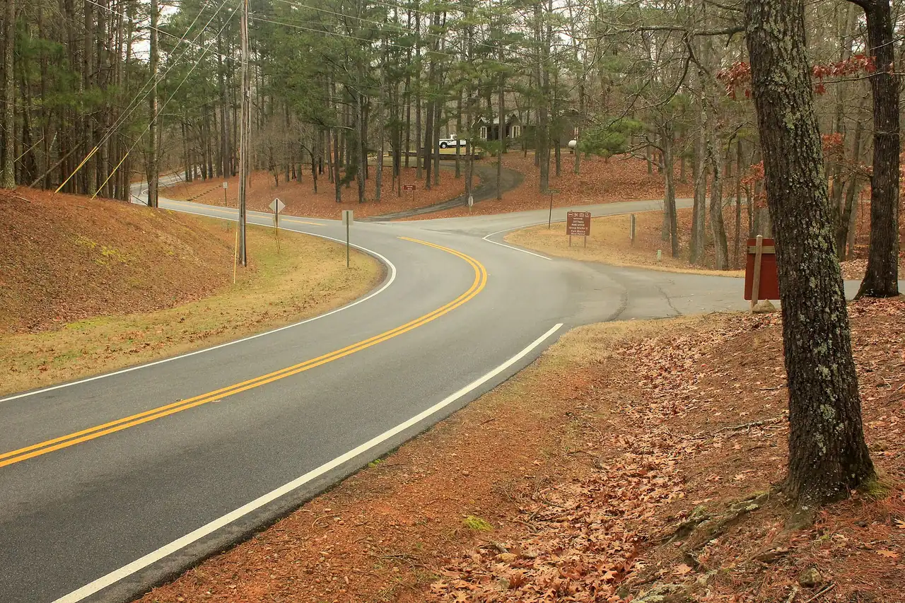 A mountain road in Georgia leading towards a land border crossing