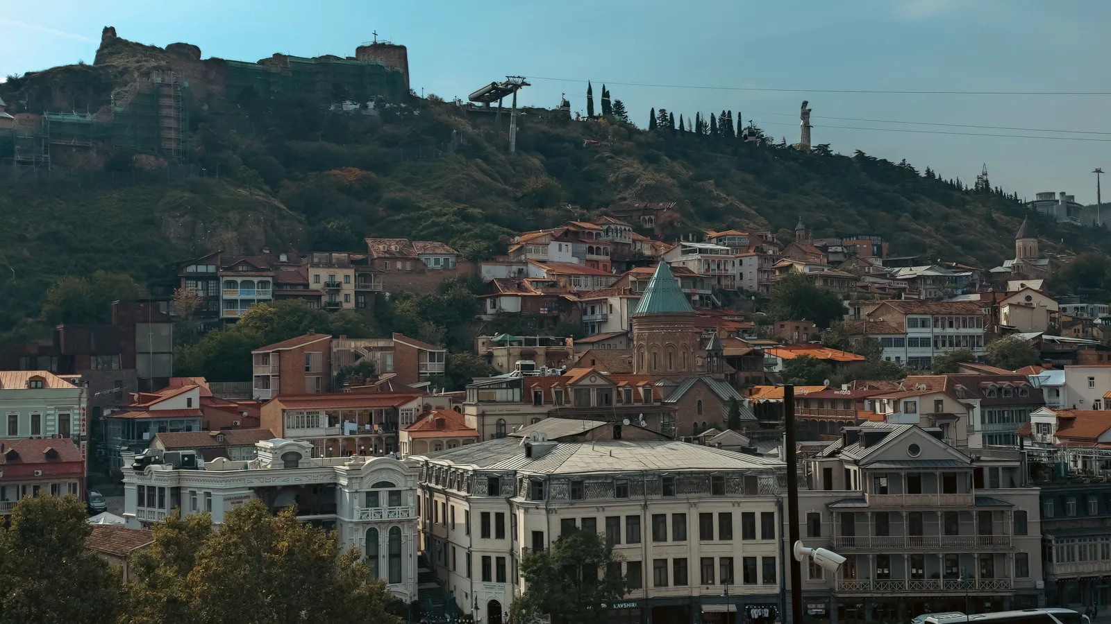 Old town rooftops of Tbilisi with the fortress on the hill above