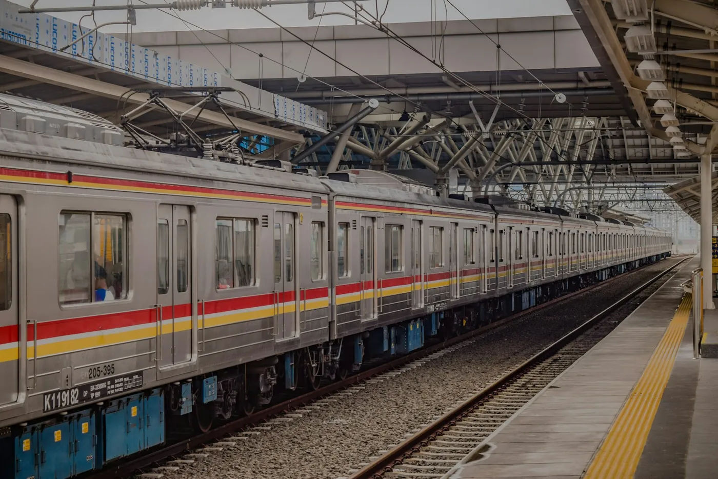 A passenger train at a station platform