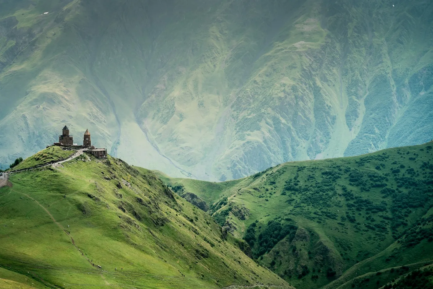 Gergeti Trinity Church below Mount Kazbek in Kazbegi, Georgia, a highlight of a one week itinerary