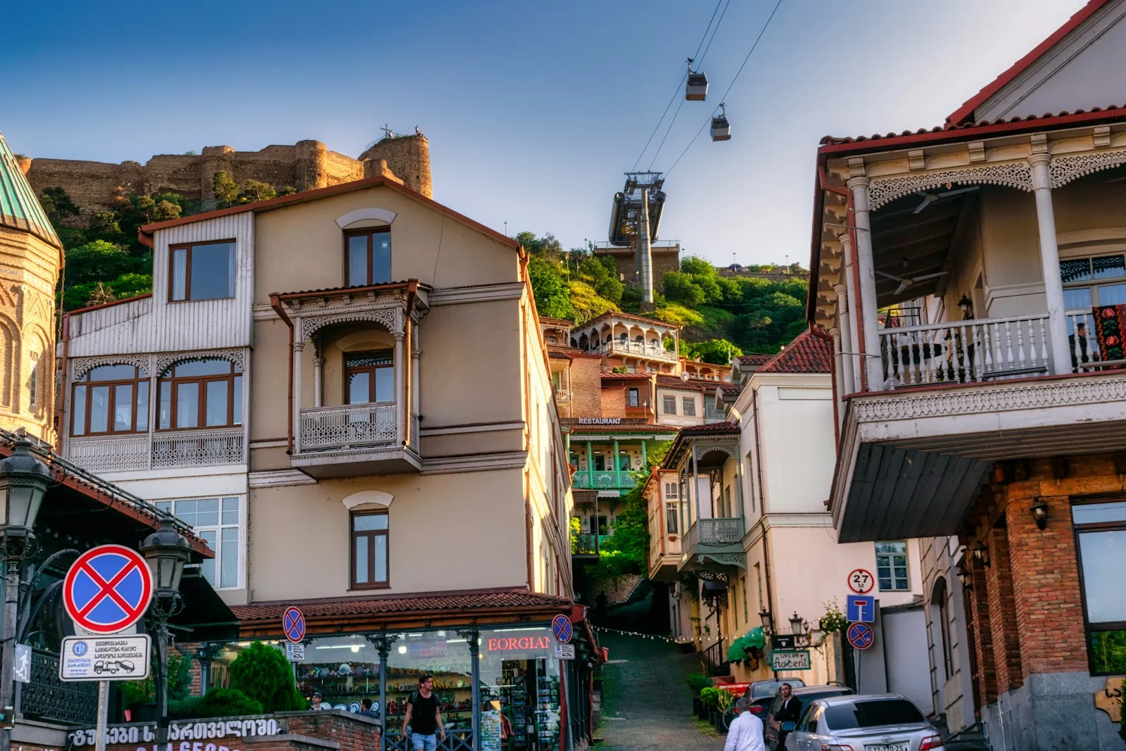 Old town street with cafes and traditional balconies in Tbilisi, Georgia