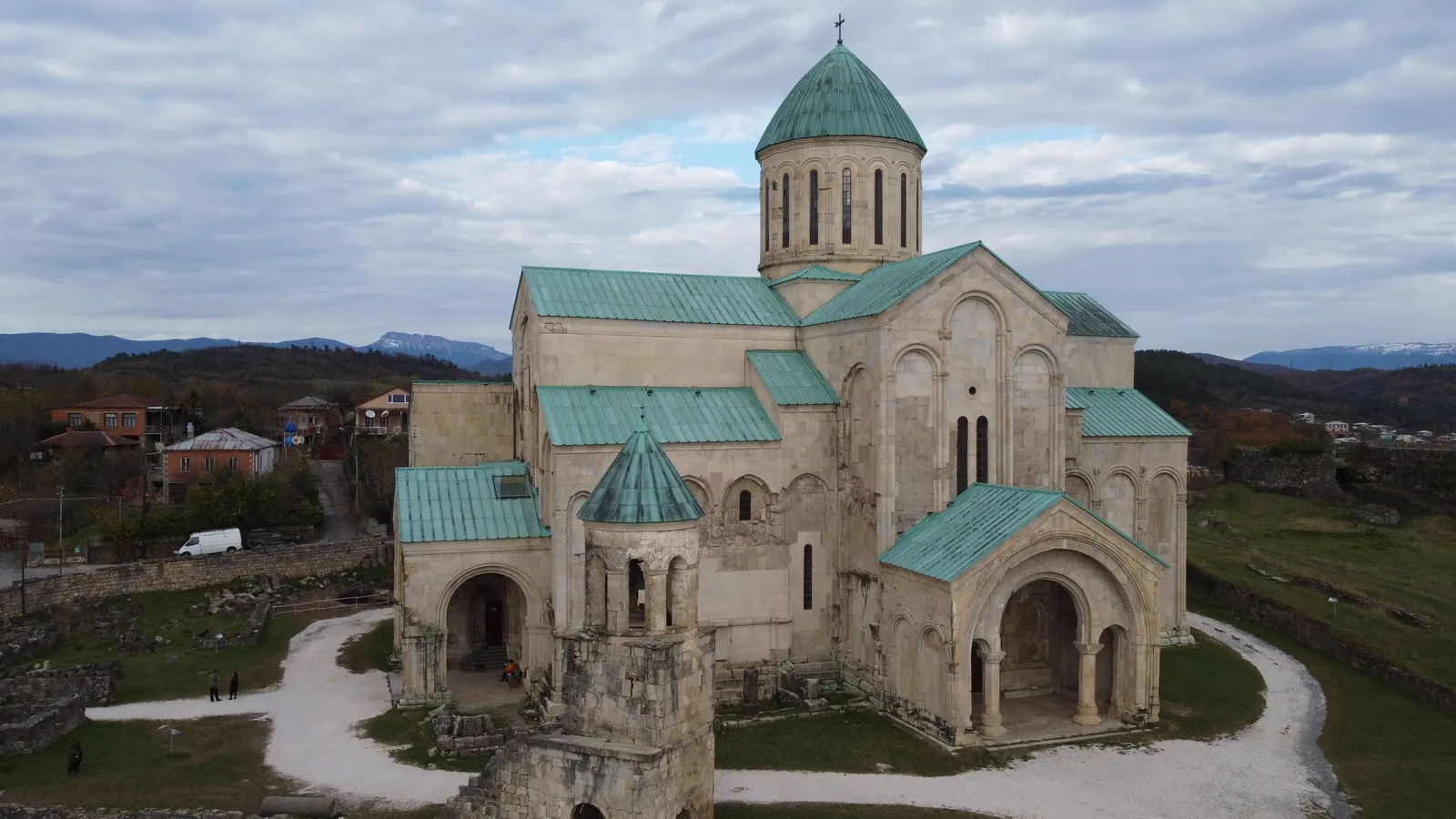 The medieval Bagrati Cathedral with its green roofs above Kutaisi, Georgia