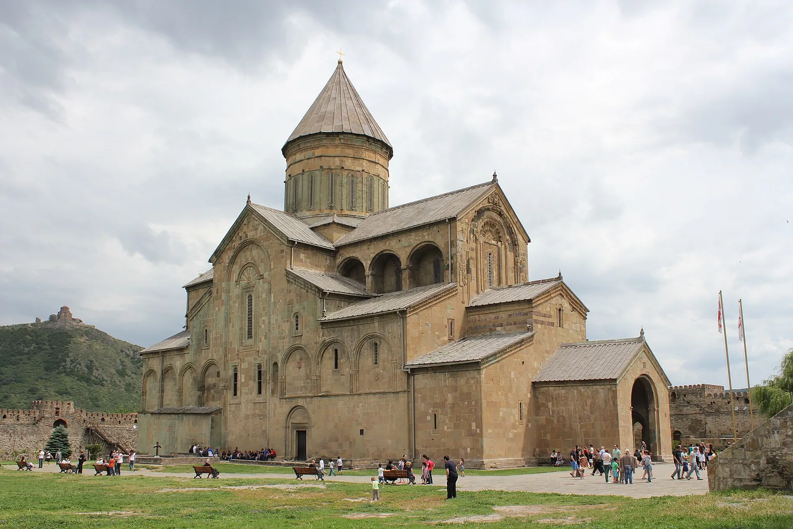 The Svetitskhoveli Cathedral seen across open ground in Mtskheta, Georgia