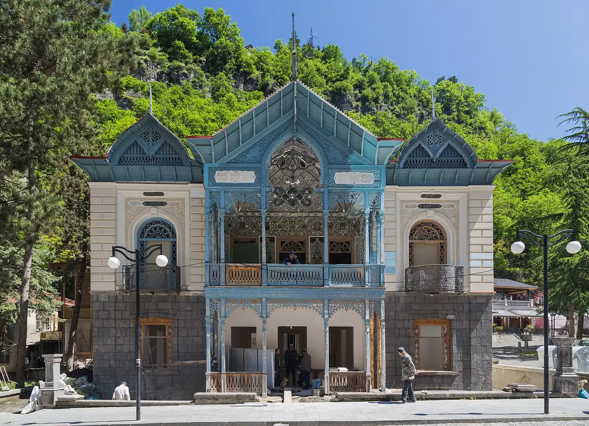 A wooden house decorated in blue and white