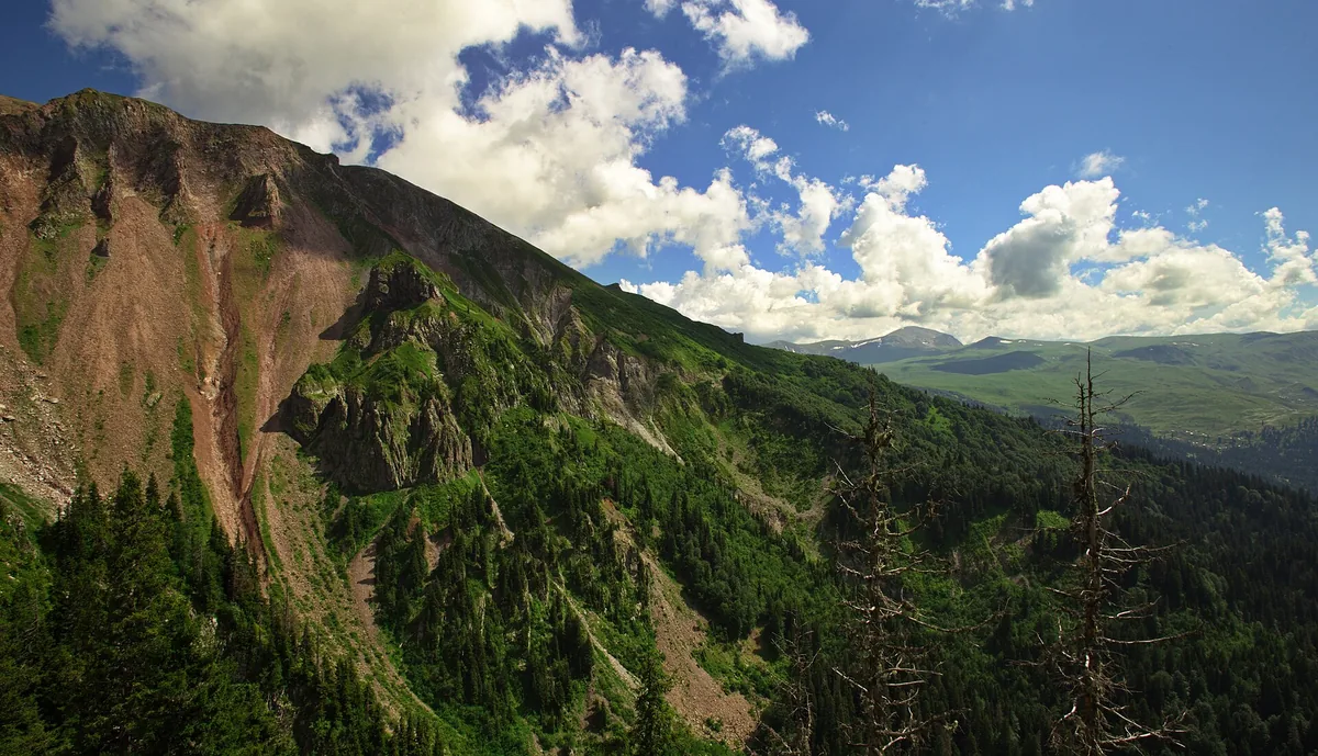 Green mountains and low cloud above the valley
