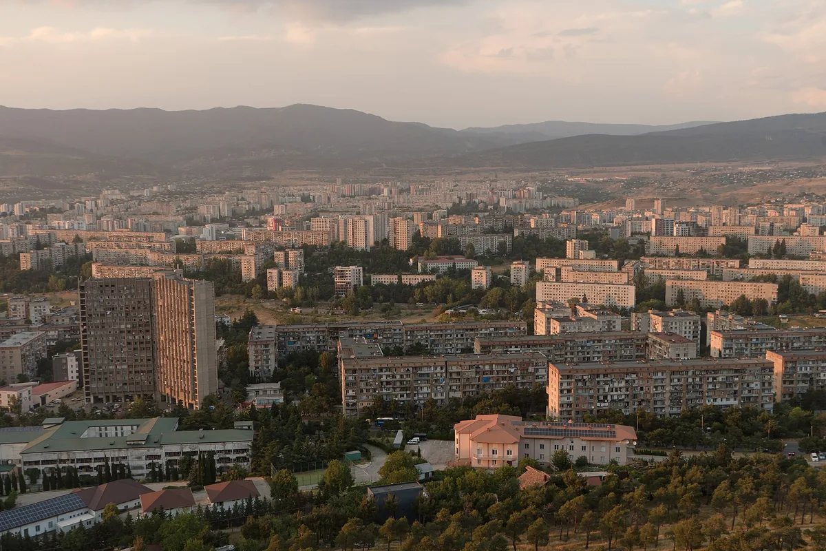 A hilltop view over the city and the ridge beyond